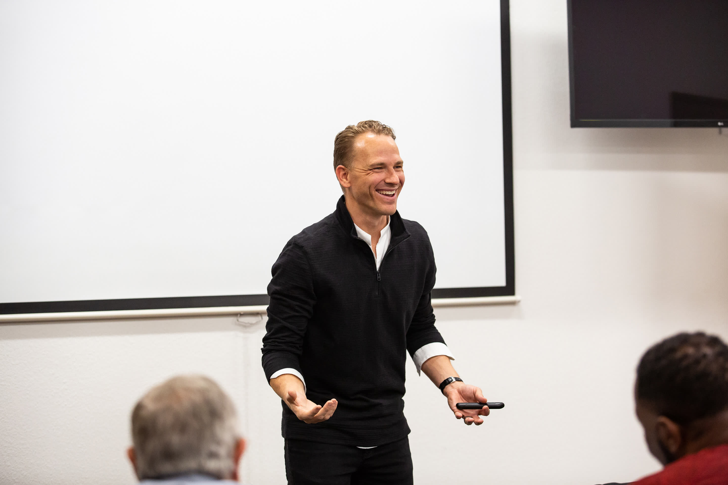 David Gerber speaking on stage